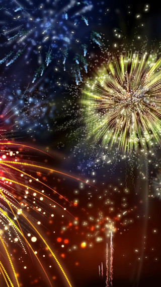 Colorful fireworks display night sky - free new year wallpaper