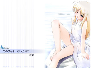 Woman white dress sitting rock - a rock free wallpaper