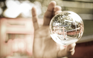 Glass ball park reflection macro - a person holding free wallpaper