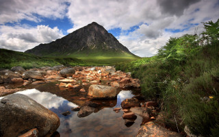 Mountain stream rocks cloudy sky 2 - impressionist free wallpaper