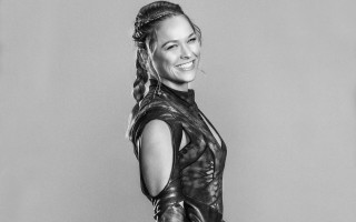 Woman leather dress smiling braid - weta digital free wallpaper