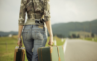 Woman suitcases camera road camouflage - the side of a road free wallpaper