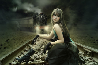 Woman sitting train track background - a train track free wallpaper