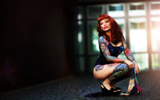 Tattooed woman sitting window bodypaint - a window in the background free wallpaper