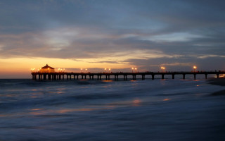 Pier lights dusk ocean waves - a pier free wallpaper