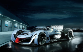 Silver race car night building - an gyeon free wallpaper for desktop