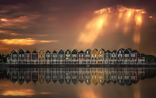 Houses lake cloudy sunbeam mystical - top of a lake under a cloudy sky free wallpaper