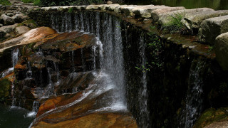Waterfall bench pond rocks plants - rock free wallpaper