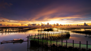 Dusk sunset boat water cityscape - a large body of water free wallpaper