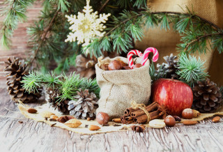 Candy canes nuts pine cones - a christmas decoration free wallpaper