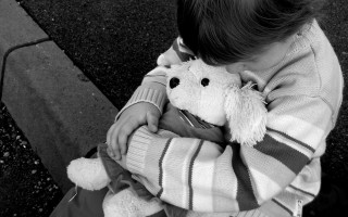Young boy stuffed animal night - a sidewalk free wallpaper