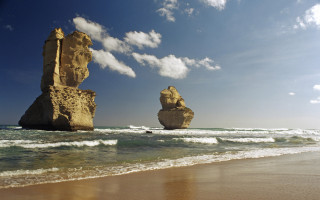 Beach rocks wave blue sky - two large rock free wallpaper