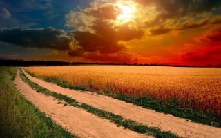 Dirt road sunset clouds mountain - a dirt road in a field free wallpaper
