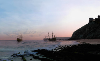 Ships ocean rocky shore castle - a hill in the distance free wallpaper