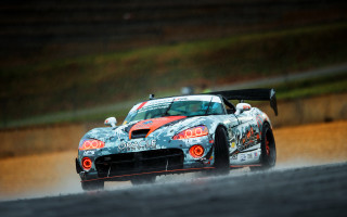 Car driving rain motion blur - a wet road in the rain free wallpaper