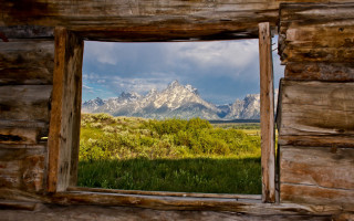 Mountain view wooden frame grass - a wooden frame free wallpaper