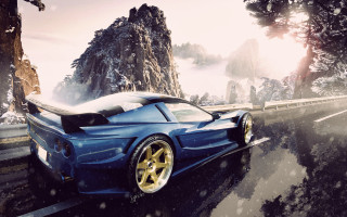 Blue sports car snow mountains - a blue sports car free wallpaper for desktop