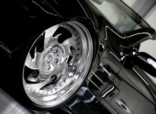 Black car chrome wheels garage - a black car free wallpaper