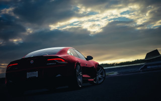 Red sports car cloudy sky 6 - photorealistic lighting free wallpaper