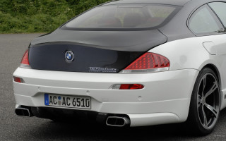 White bmw car parking lot - a dog free wallpaper