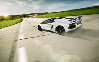 White sports car green field - a lush green field free wallpaper
