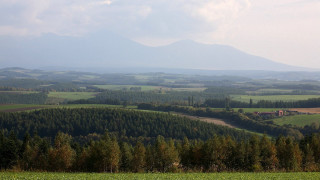Lush green countryside house mountains - murata range free wallpaper