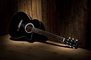 Guitar wooden table spotlight wall - a guitar free wallpaper