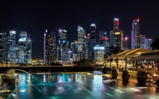City skyline pool fountain night - cityscape free wallpaper