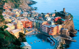 Cliffside village ocean harbor boat - the other side free wallpaper