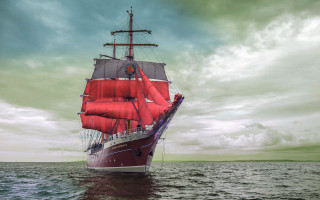 Red white boat ocean cloudy - the ocean under a cloudy sky free wallpaper