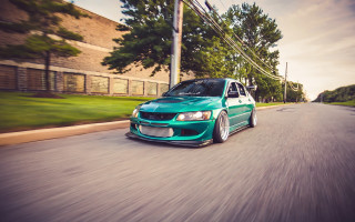 Green car street lush field - a street next free wallpaper
