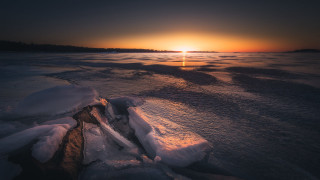 Sunset frozen lake trees city - a sunset over a free wallpaper