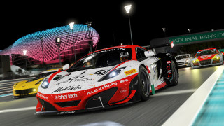 Racing car night race track - other car behind free wallpaper