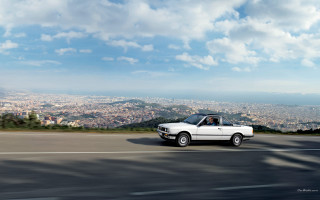 White car city horizon beach - a white car free wallpaper