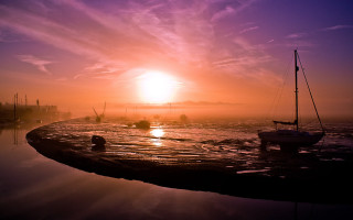 Boat water sunset foggy sky - a foggy sky in the background free wallpaper