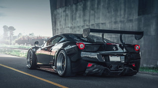 Black sports car driving building - a large window free wallpaper