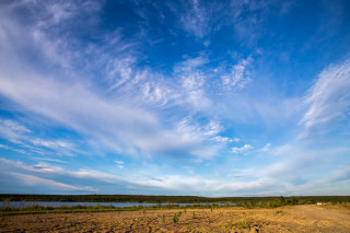 Dirt road water horizon mountains - ultra wide angle free wallpaper