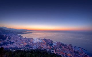 City ocean mountains sunset bridge - orange glow free wallpaper