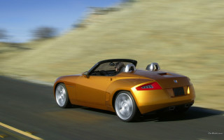 Yellow sports car hillside driving - ray free wallpaper