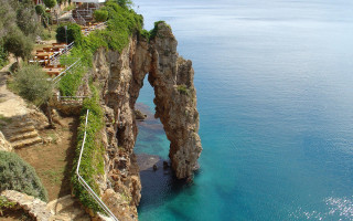 Cliff rock formation ocean walkway - a walkway free wallpaper