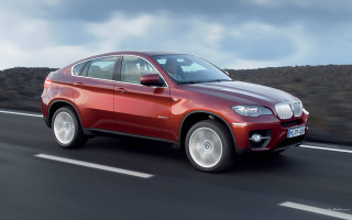 Red bmw suv driving cloudy - constant permeke free wallpaper