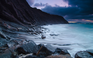Boat shore beach stormy night - the shore of a beach free wallpaper