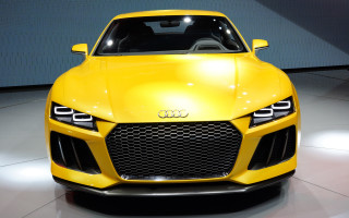 Yellow sports car showroom large - a yellow sports car free wallpaper