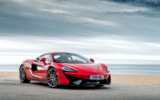 Red sports car beach ocean - under free wallpaper for desktop