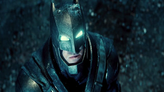 Batman costume dark knight glowing - a man in a batman costume free wallpaper