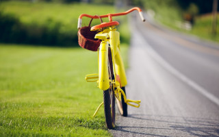Yellow bike summer vibrancy tiltshift - the side of a road next free wallpaper