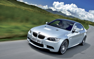 Silver car green hills clouds - a silver car free wallpaper