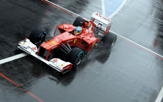 Red racecar wettrack rain pilot - a red race car free wallpaper