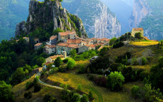 Mountain village valley tiltshift landscape - a few tree and bushes free wallpaper