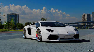 White sports car city skyline - a bridge in the background free wallpaper